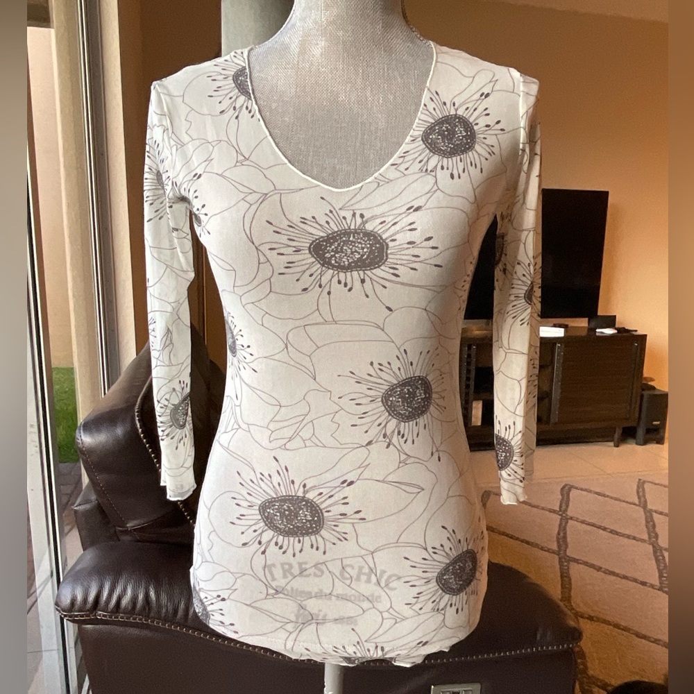 Very nice mesh top, no tag or brand ,size small. Very sexy . See-through.